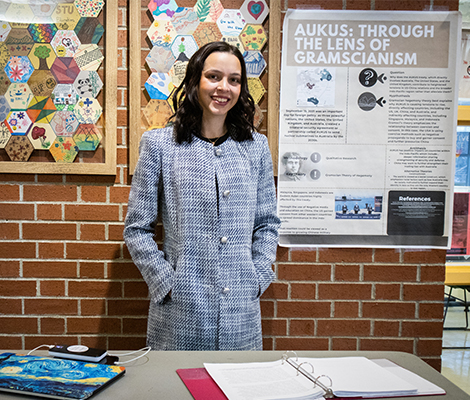 Female student presenter at SRIF 2024 poster presentation