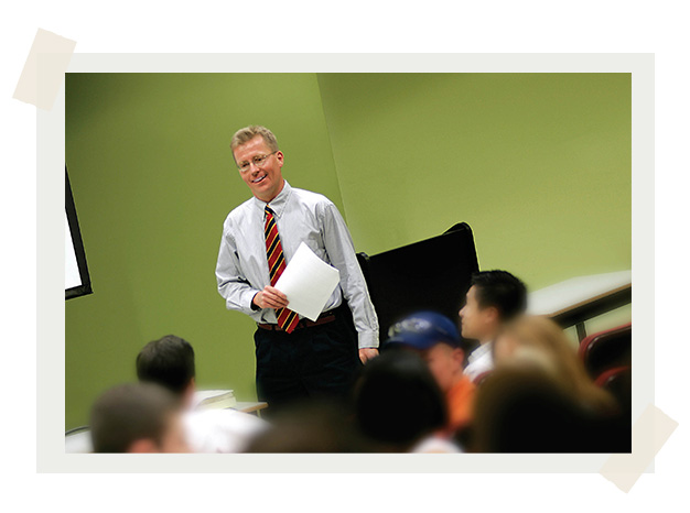 Dr. Tom Bateman teaching in a classroom