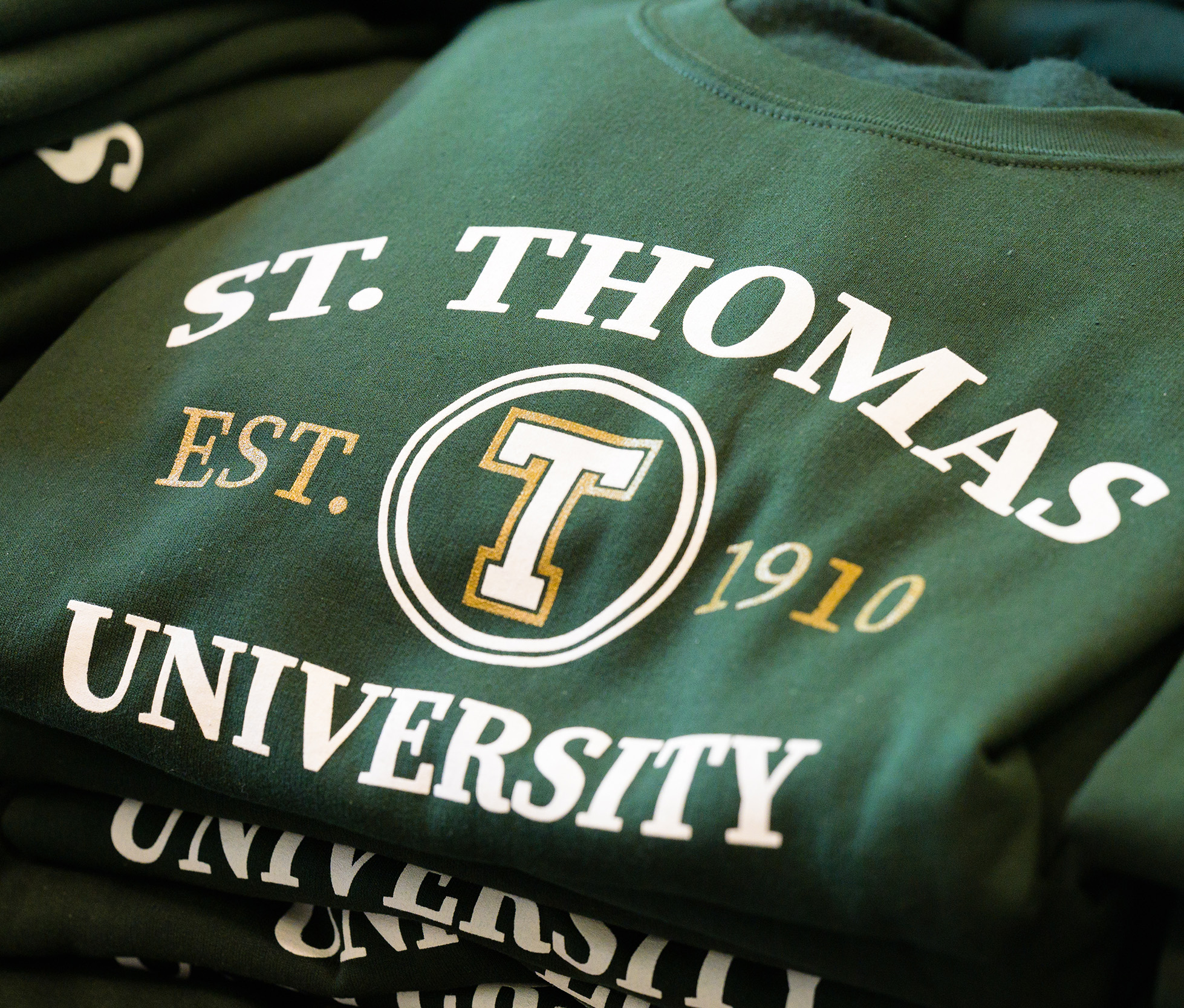 Image of St. Thomas University hoodie, green